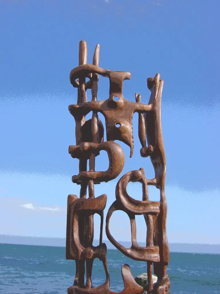 Bronze abstract structure, evoking geometric balance.